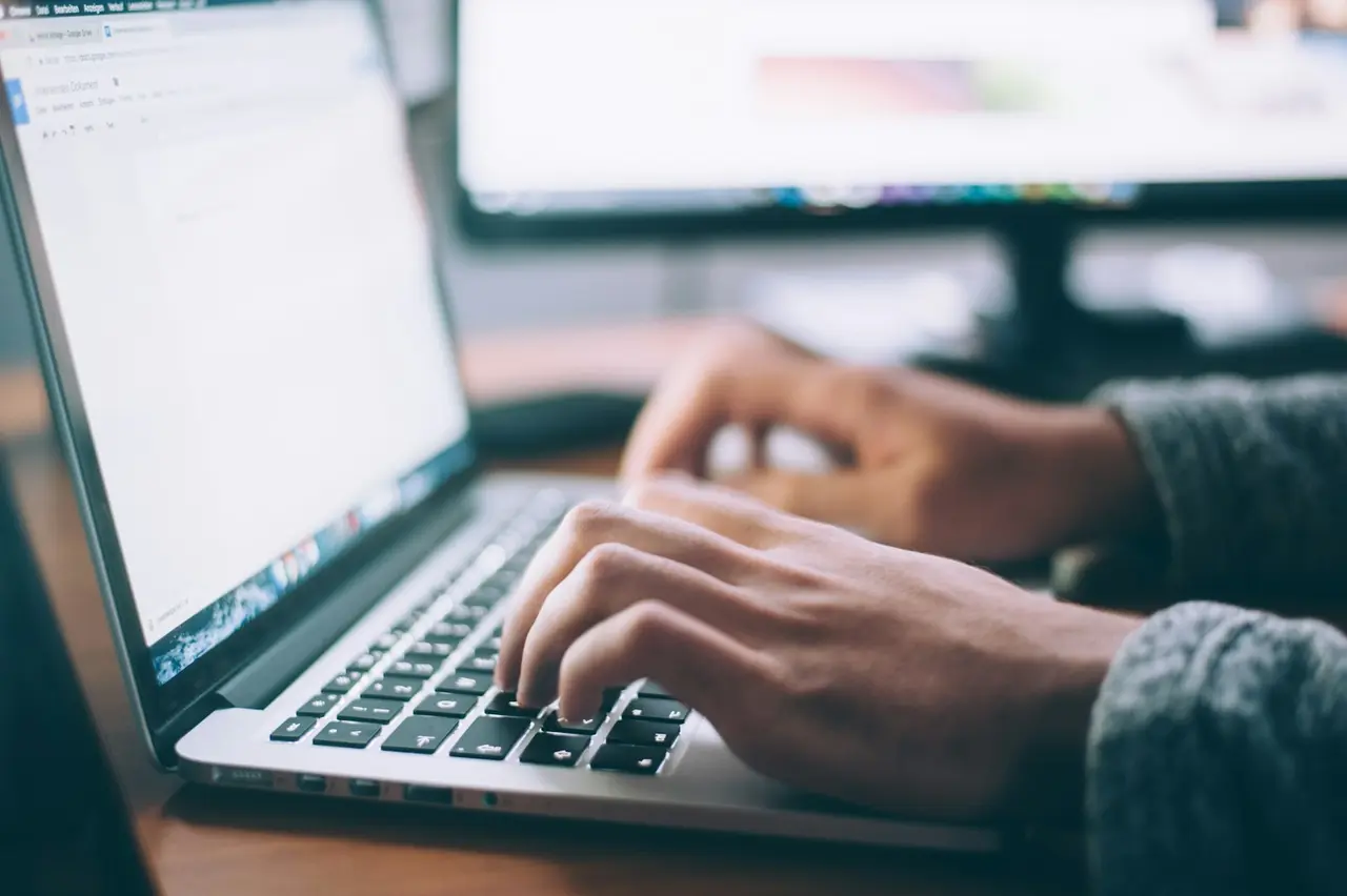 Writing content on a laptop